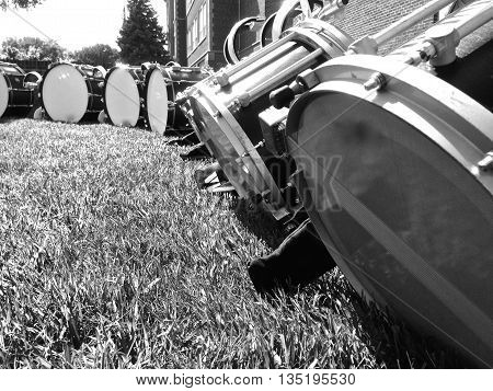 Drumline drums setup ready for rehearsal to begin.