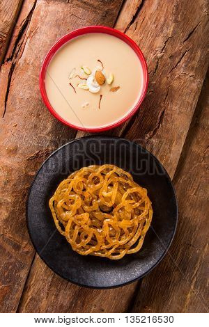 jalebi with rabdi made from condensing milk, famous dessert sweet from India