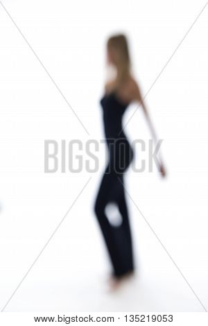 Blurry Woman Dancing On A White Backdrop