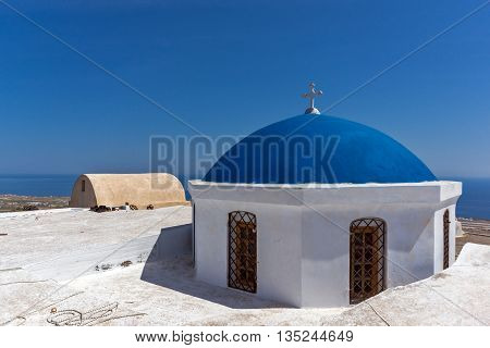 Blue roof of church and Panoramic view to Santorini island, Thira, Cyclades, Greece