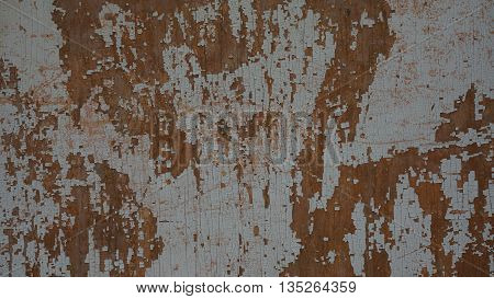 paint on a wooden fence like rust on metal