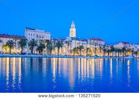 Waterfront view at coastline panorama of town of Split in blue hour, Croatia.