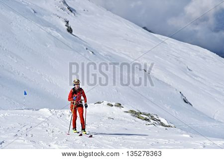 FAGARAS ROMANIA - MARCH 5: Ski mountaineer competes during the Ski Mountaineering National Competition in Fagaras Mountains Carpathian Range on March 5 2016 in Romania.