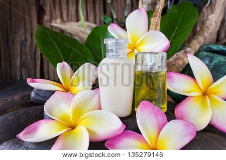 Mini Set Of Bubble Bath And Shower Gel Liquid With Pink White And Yellow Flowers Plumeria Or Frangia