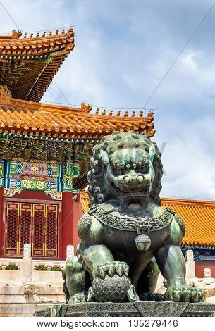 Bronze lion in front of the Hall of Supreme Harmony in Beijing Forbidden City, China