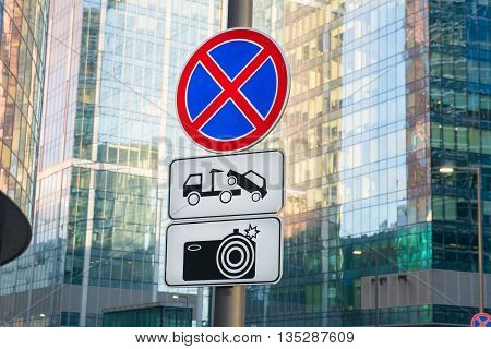Road Sign - No Stopping. Work tow and photofixation