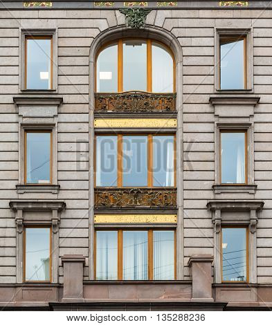 St. Petersburg Russia - May 16 2016: Several windows in a row on facade of Singer House front view