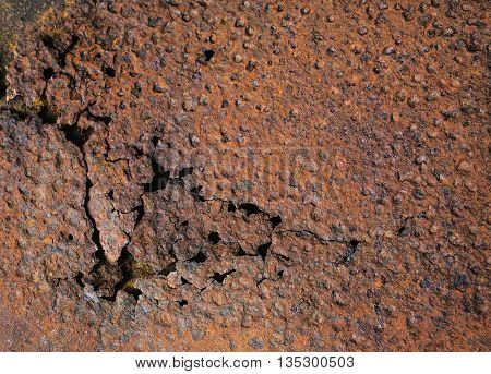 Rusty old plate texture with some cracks.