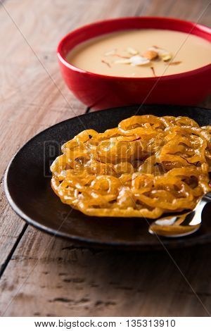 jalebi with rabdi made from condensing milk, famous dessert sweet from India