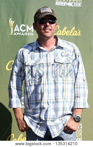 ARLINGTON, TX - APR 18: Singer Casey Donahew attends the ACM & Cabela'??s Great Outdoor Archery Event at the Texas Rangers Youth Ballpark on April 18, 2015.