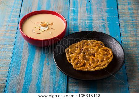 jalebi with rabdi made from condensing milk, famous dessert sweet from India