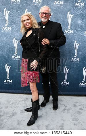 NASHVILLE, TN-SEP 1: Tim Dubois (R) and wife Pam Dubois attend the 9th Annual ACM Honors at the Ryman Auditorium on September 1, 2015 in Nashville, Tennessee.