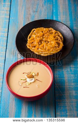 jalebi or imarati with rabdi made from condensing milk, famous dessert sweet from India