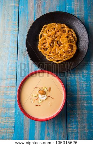 jalebi or imarati with rabdi made from condensing milk, famous dessert sweet from India