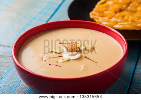 jalebi or imarati with rabdi made from condensing milk, famous dessert sweet from India