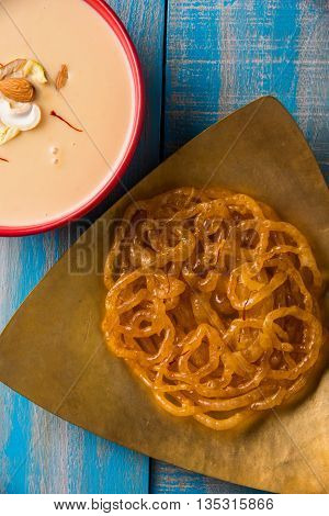 jalebi or imarati with rabdi made from condensing milk, famous dessert sweet from India