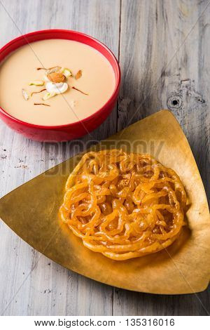 jalebi or imarati with rabdi made from condensing milk, famous dessert sweet from India