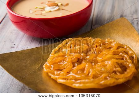 jalebi or imarati with rabdi made from condensing milk, famous dessert sweet from India