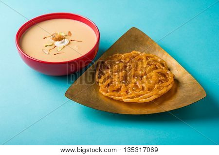 jalebi or imarati with rabdi made from condensing milk, famous dessert sweet from India
