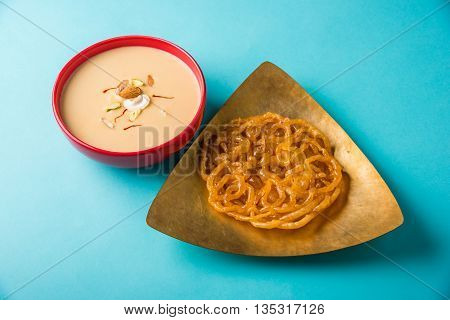 jalebi or imarati with rabdi made from condensing milk, famous dessert sweet from India