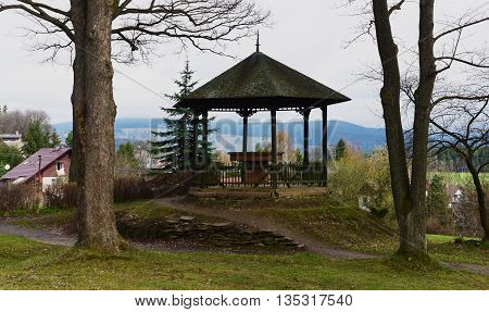Vysoke nad Jizerou city in rainy spring with Krkonose mountains