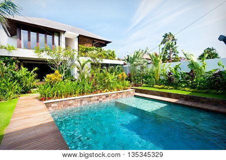 Modern Blue Water Swimming Pool In A Luxury House