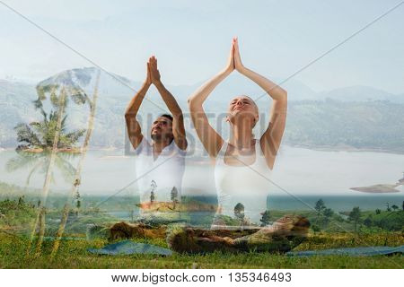 yoga retreat, fitness, sport and lifestyle concept - smiling couple making exercises sitting on mats outdoors, double exposure effect