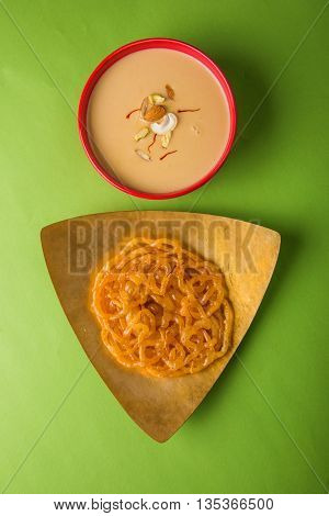 jalebi or imarati with rabdi made from condensing milk, famous dessert sweet from India
