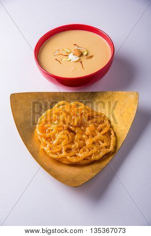 jalebi or imarati with rabdi made from condensing milk, famous dessert sweet from India