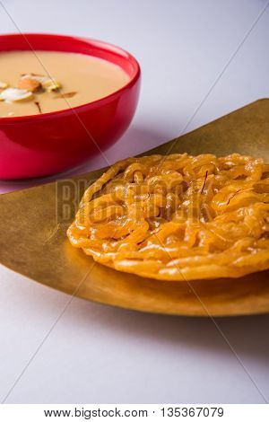 jalebi or imarati with rabdi made from condensing milk, famous dessert sweet from India