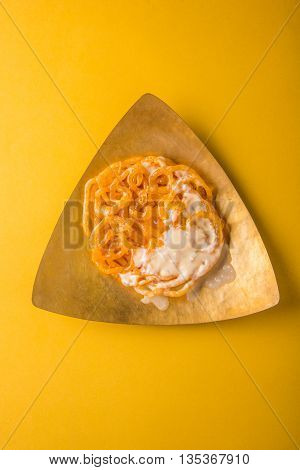jalebi or imarati with rabdi made from condensing milk, famous dessert sweet from India