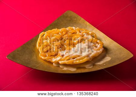 jalebi or imarati with rabdi made from condensing milk, famous dessert sweet from India