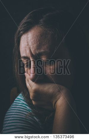 woamn duffering from Fear, loneliness, depression, abuse, addiction