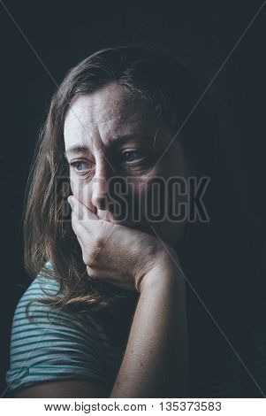 woamn duffering from Fear, loneliness, depression, abuse, addiction