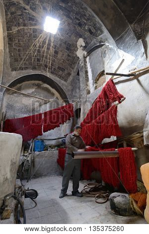KASHAN IRAN - APRIL 20: colored yarn in market (Bazaar) in Kashan Iran on April 20 2015. Bazaar of Kashan is the most important tourist attraction in Kashan Iran.