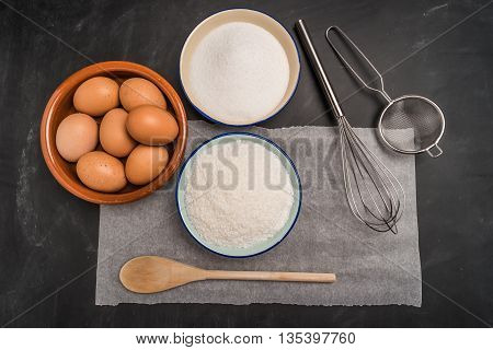 Ingredients for baking a cookies. Recipe for coconut macaroons. Top view with copy space.