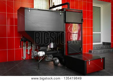 Solid-fuel boiler in the boiler room