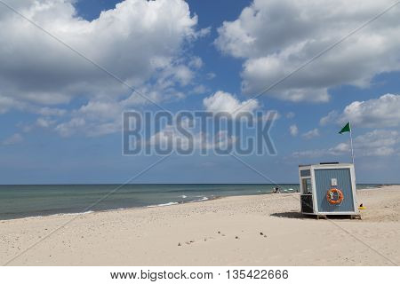 Tisvilde, Denmark - June 20, 2016: Wooden Lifeguard hut at Tisvilde beach.