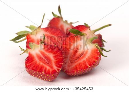 Half Of Strawberry Isolated On White Background