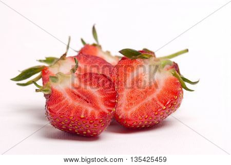 Half Of Strawberry Isolated On White Background