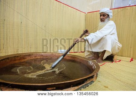 NIZWA, OMAN, MAY 27, 2016: Saif Al Saifi is one of the most experienced makers of traditional Omani halwa