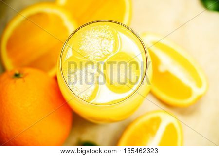 Glass of fresh orange juice with ice