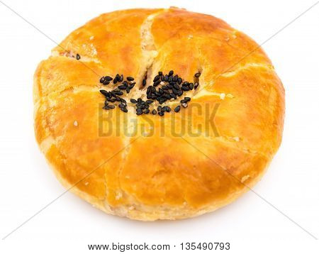 traditional chinese biscuit with seasame on top on white background