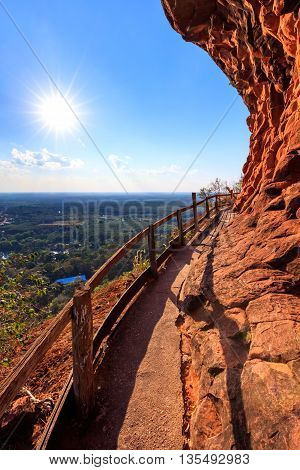 Cliff side wooden bridge at Wat Phu tok temple Bueng Kan Thailand