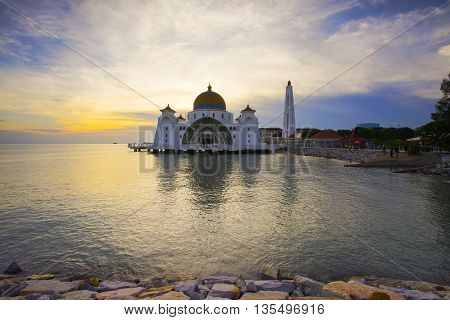 Majestic view of Malacca Straits Mosque during sunset.