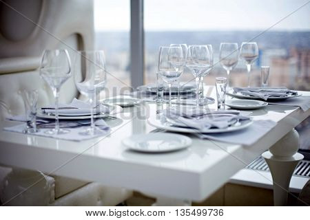 Banquet table. Close up of empty glasses