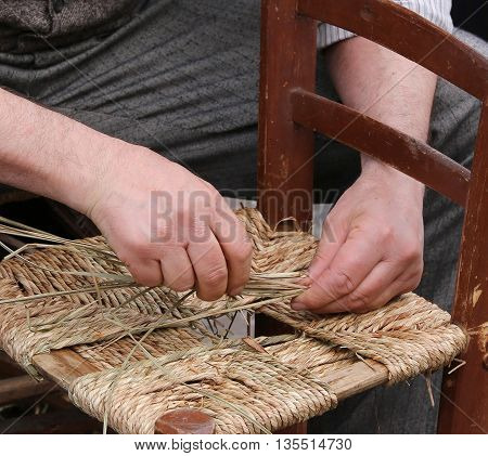 Hands Of An Elderly Craftsman