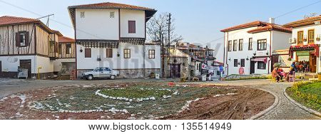 ANKARA TURKEY - JANUARY 16 2015: The square and the large flower bed in the tourist neighborhood of the city known as the Turkish village on January 16 in Ankara.
