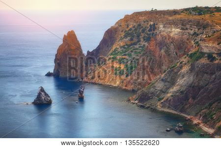 The coast at the cape Fiolent. The top view on the sea and rocks of the cape Fiolent. Crimea