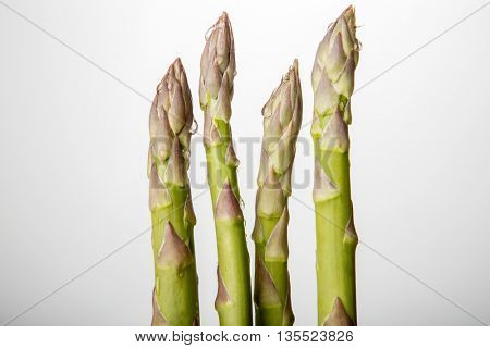Green wet asparagus on the table
